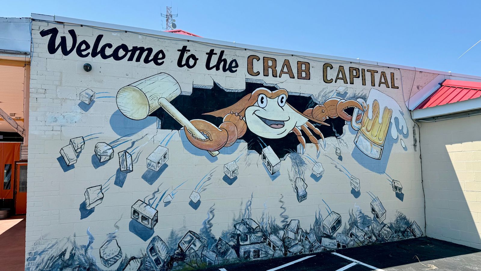 The Welcome to the Crab Capital mural painted on the side of the Crab Place facility